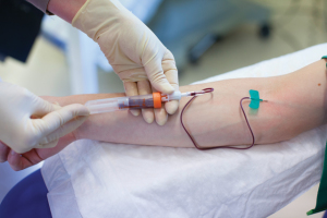 Figure 2. Minimally invasive liquid biopsies based upon blood, urine, or other body fluids hold promise for improving diagnosis and patient care for many conditions. Photo courtesy Qiagen and Andreas Fechner. 