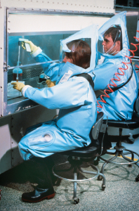 Personal protective equipment and regulated air flows prevent pathogen exposure in a CDC biosafety level 4 lab. Photo by James Gathany courtesy CDC.